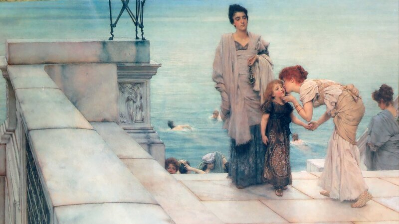Women and child by the sea