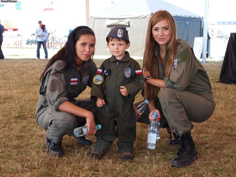 Women and child in flight suits