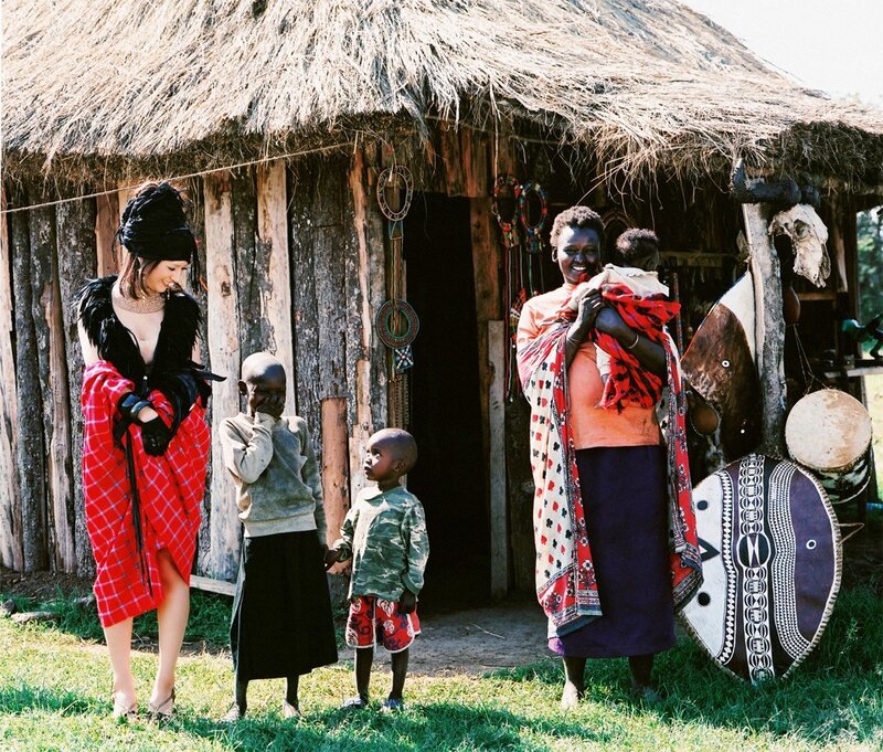 Women and children in a village