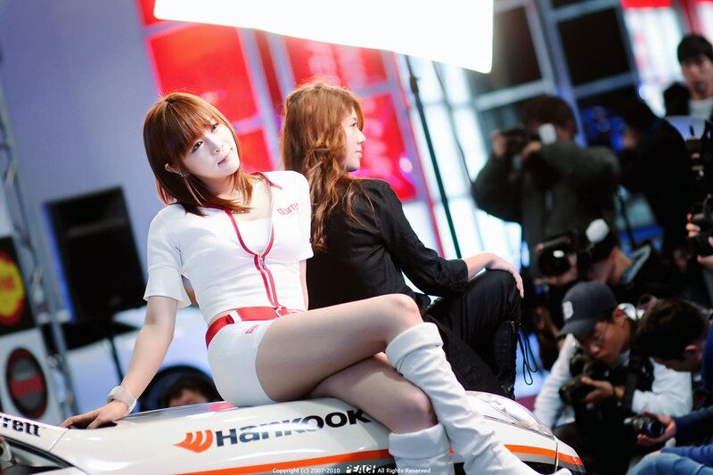 Women at a car show event