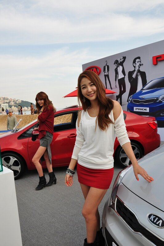 Women at a car show event