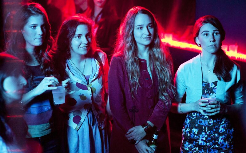 Women at a party with drinks