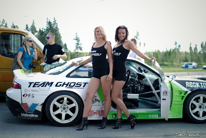 Women at a race car event