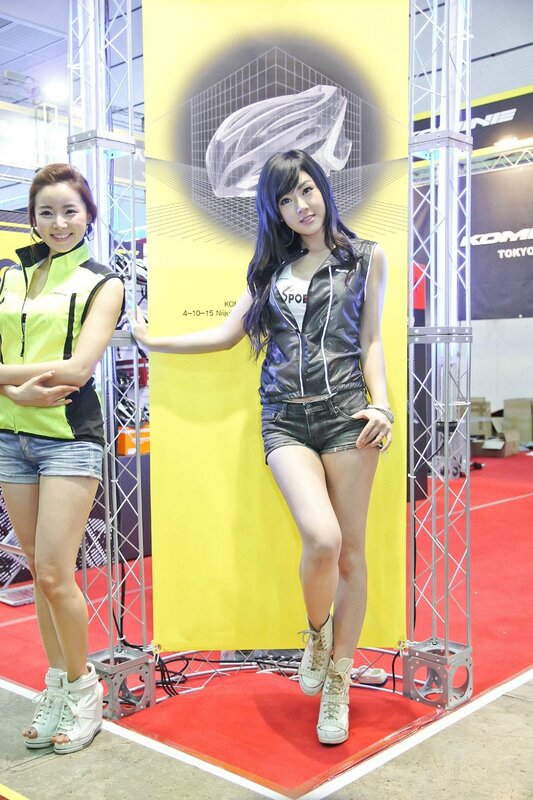 Women at a trade show booth