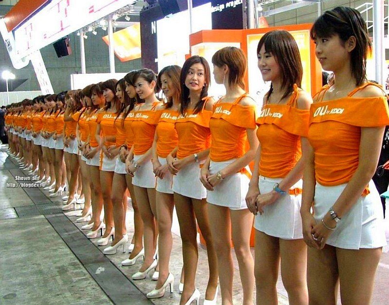 Women at an auto show event