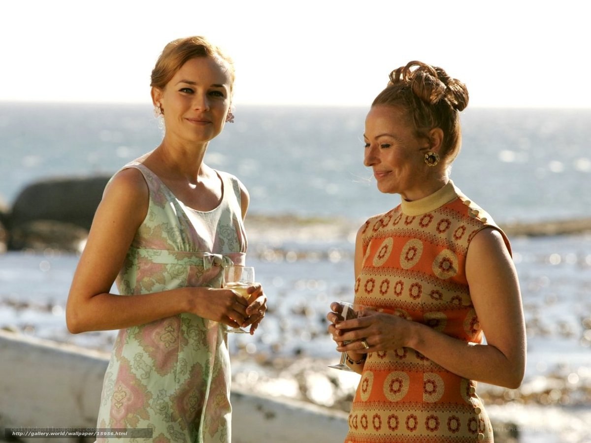 Women at seaside with drinks