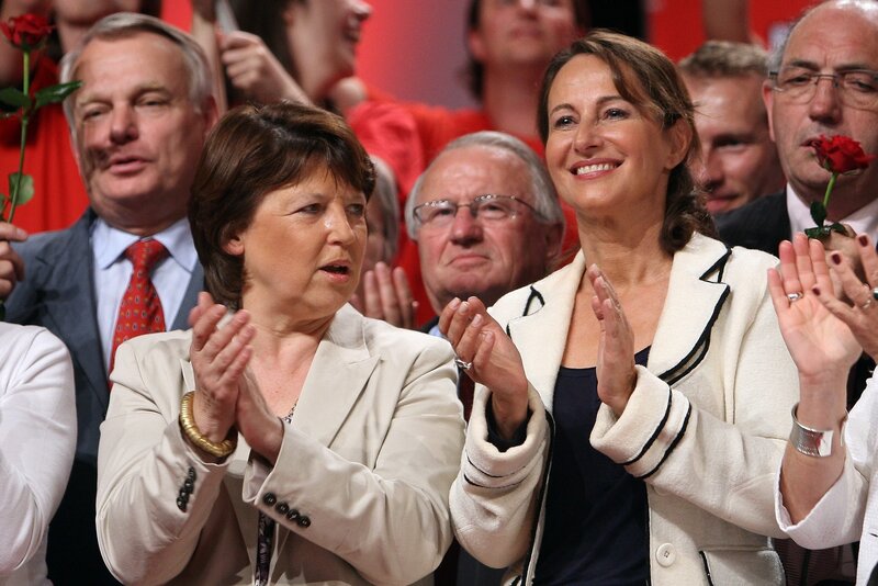 Women clapping at an event