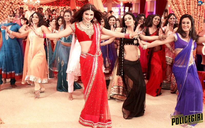 Women dancing in traditional Indian attire