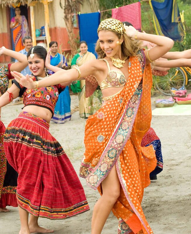 Women dancing in traditional Indian attire