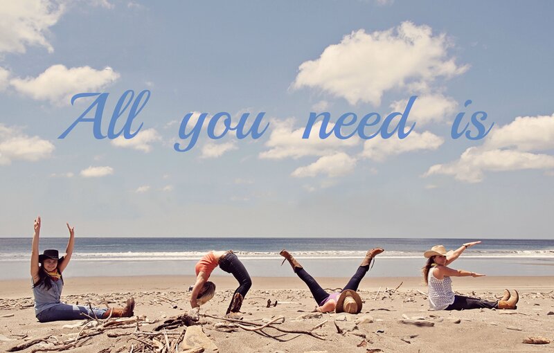 Women Doing Yoga on Beach