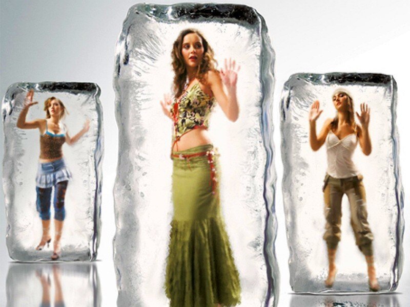 women encased in ice blocks