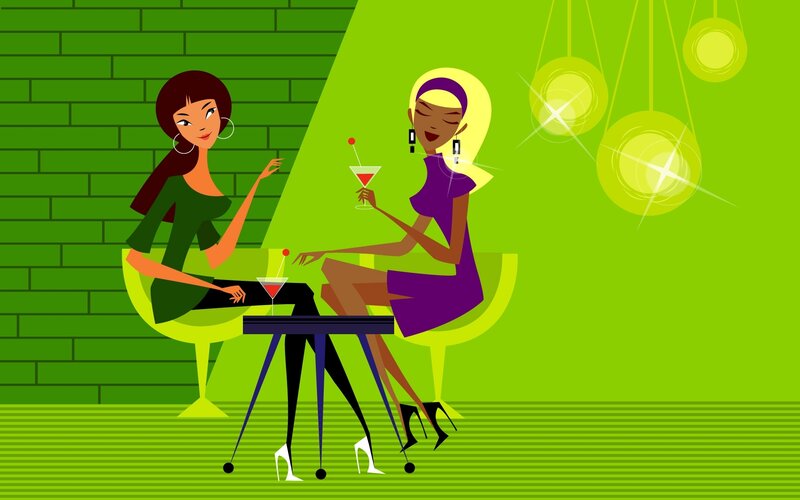 Women enjoying cocktails at a bar