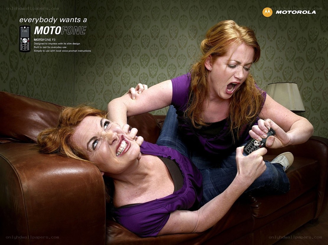 Women fighting over a phone