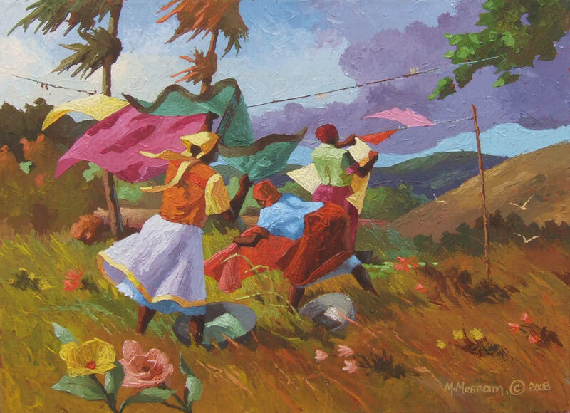 Women hanging laundry in a field
