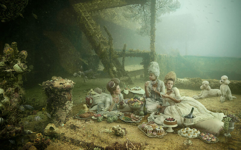 Women Having Underwater Picnic
