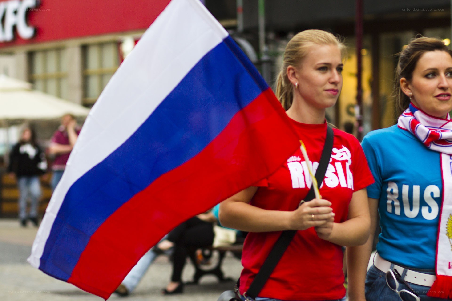Women holding Russian flag