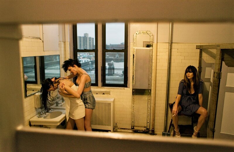 Women in a bathroom scene