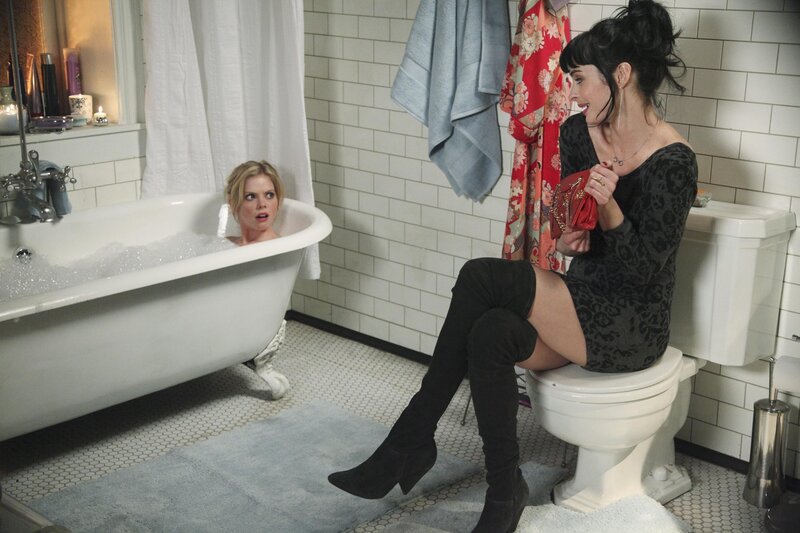 Women in a bathroom scene