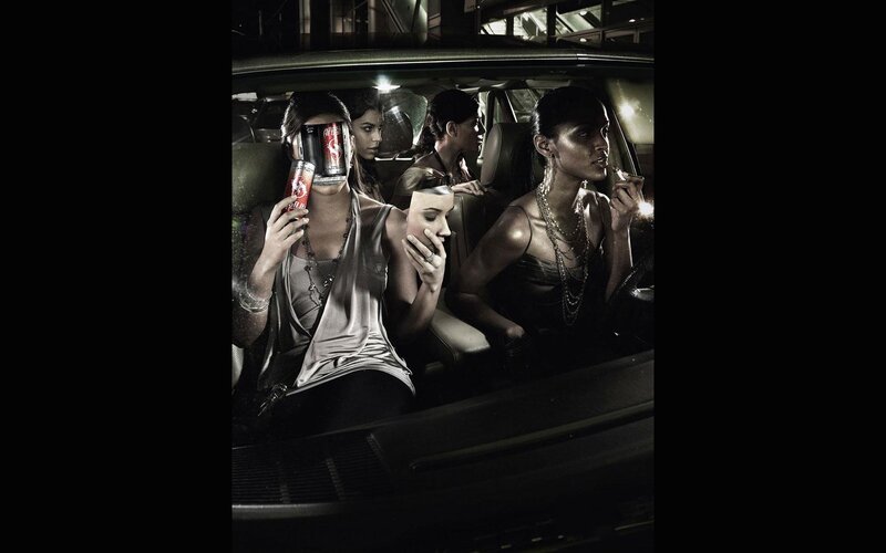 Women in a car at night