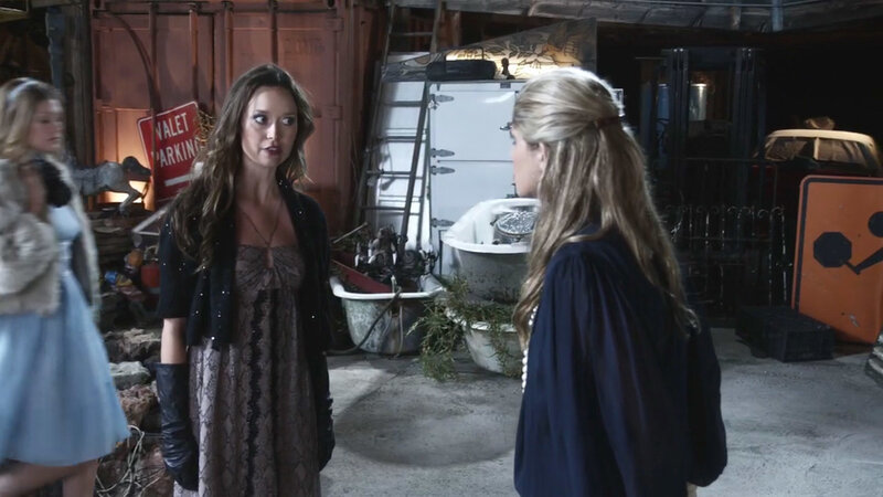 women in a junkyard