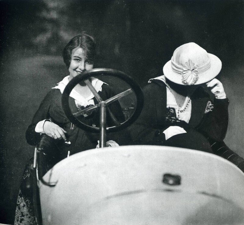 Women in a vintage car