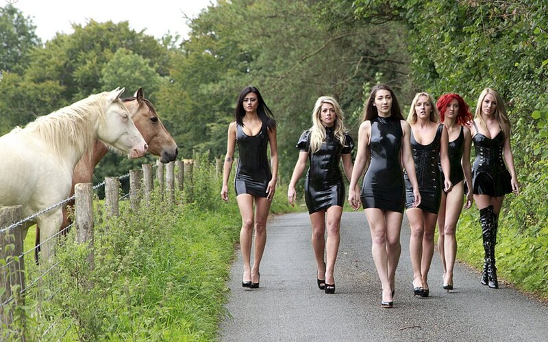 Women in Black Outfits — Dramatic
