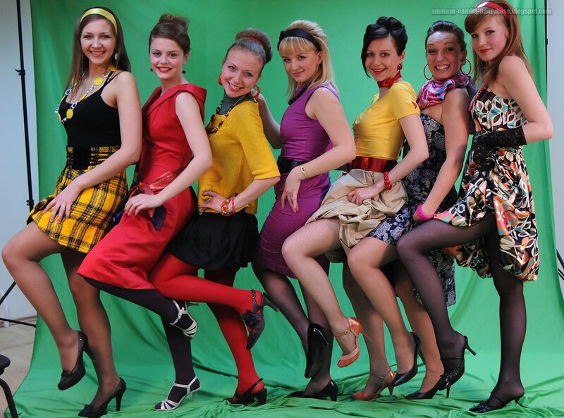Women in colorful dresses posing