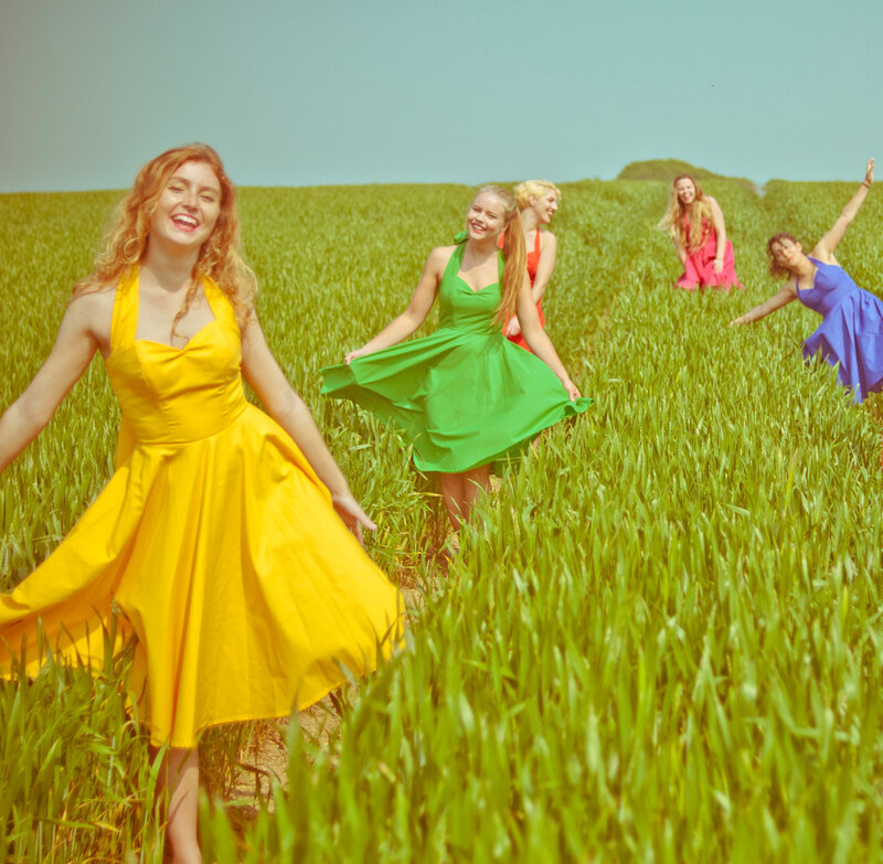 Women in Colorful Dresses — Yellow