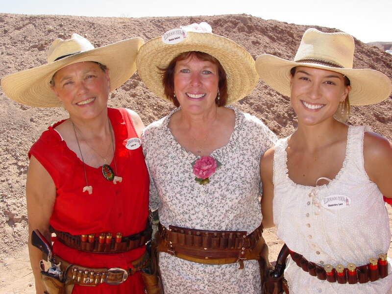 Women in cowboy hats at event