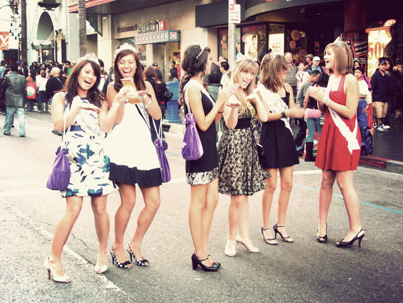 Women in dresses on a street
