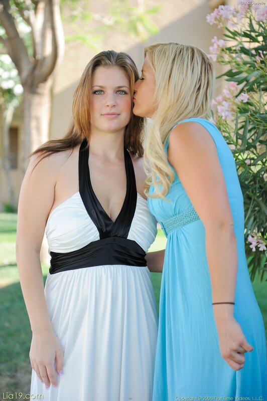 Women in formal dresses outdoors