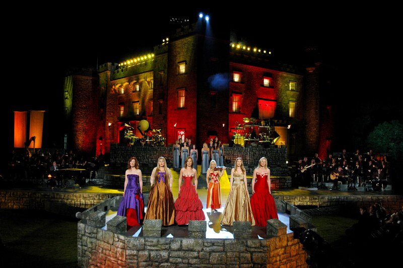 Women in Gowns on Stage