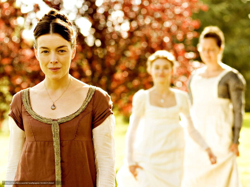 Women in period dresses in a garden