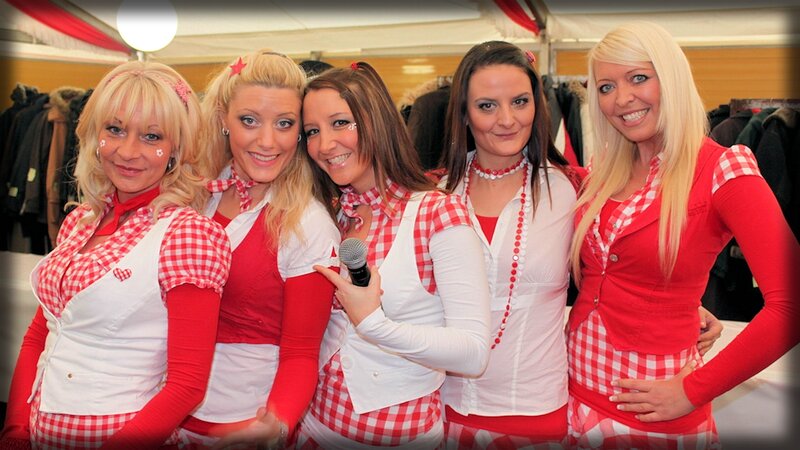 women in red and white outfits