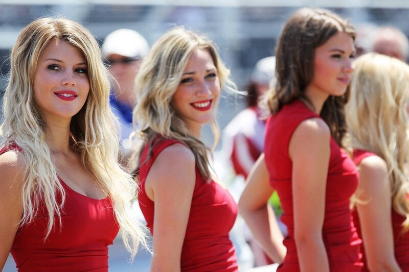 Women in red dresses at an event