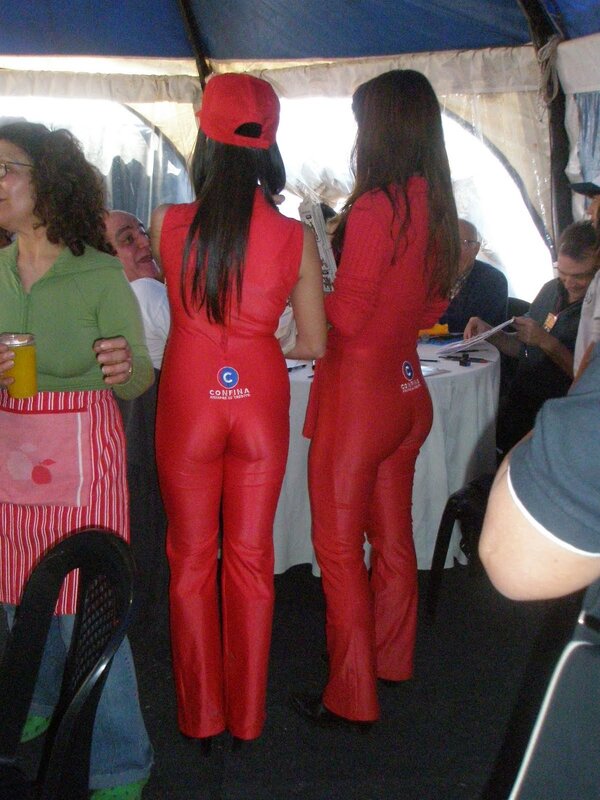 Women in red jumpsuits at event