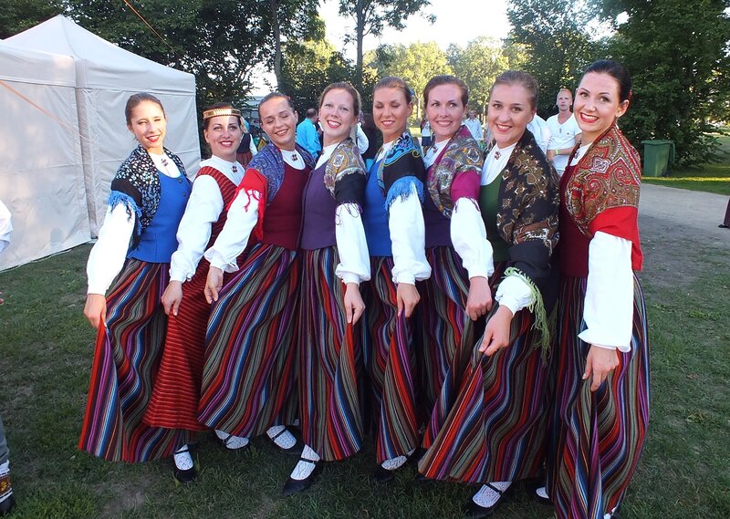 Women in Traditional Dresses — Red