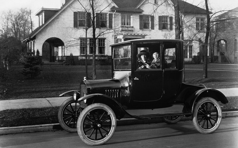 Women in vintage car
