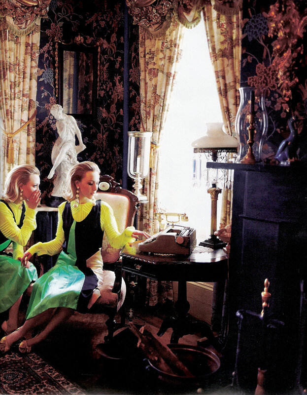 Women in vintage room with typewriter