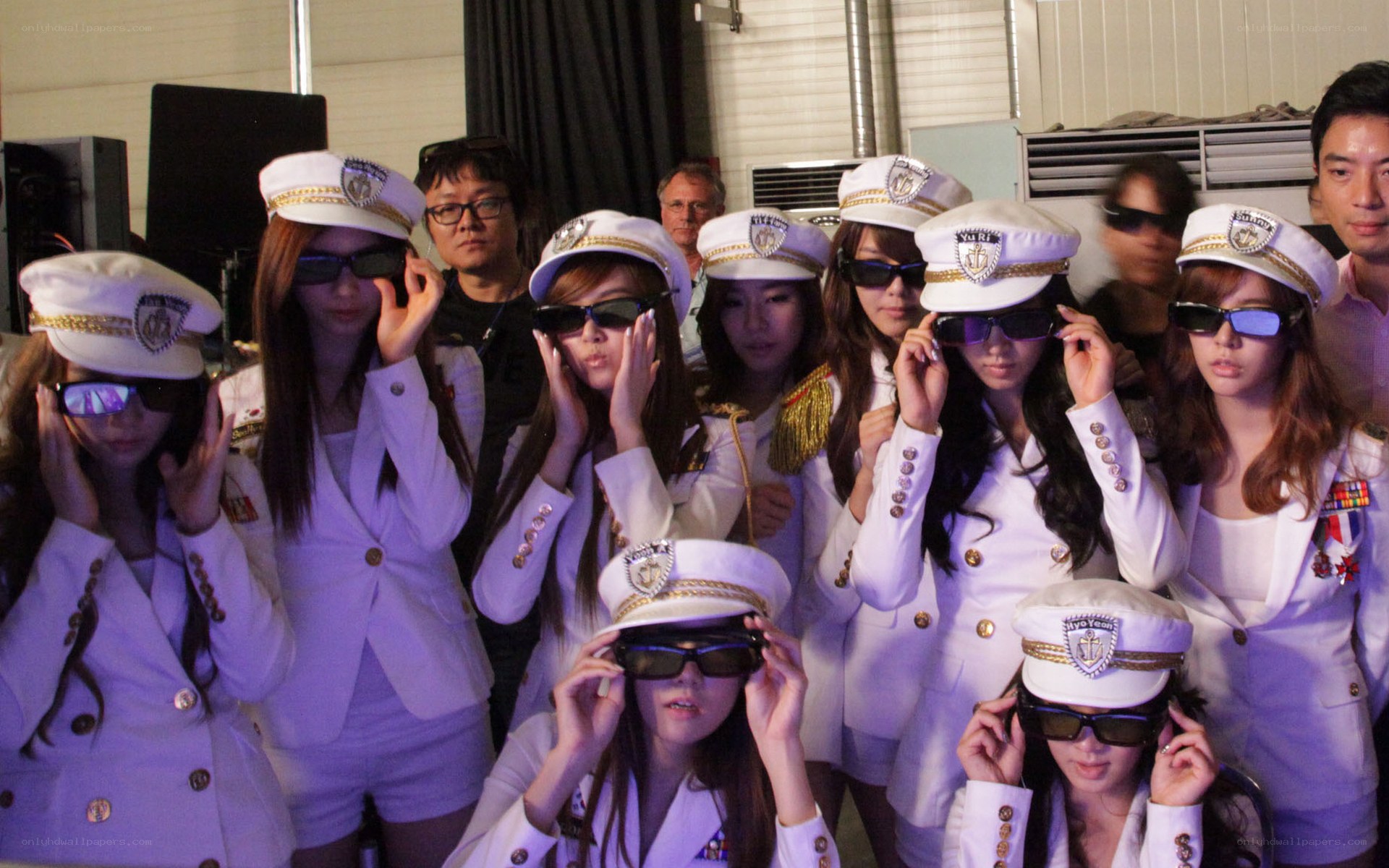 women in white uniforms posing