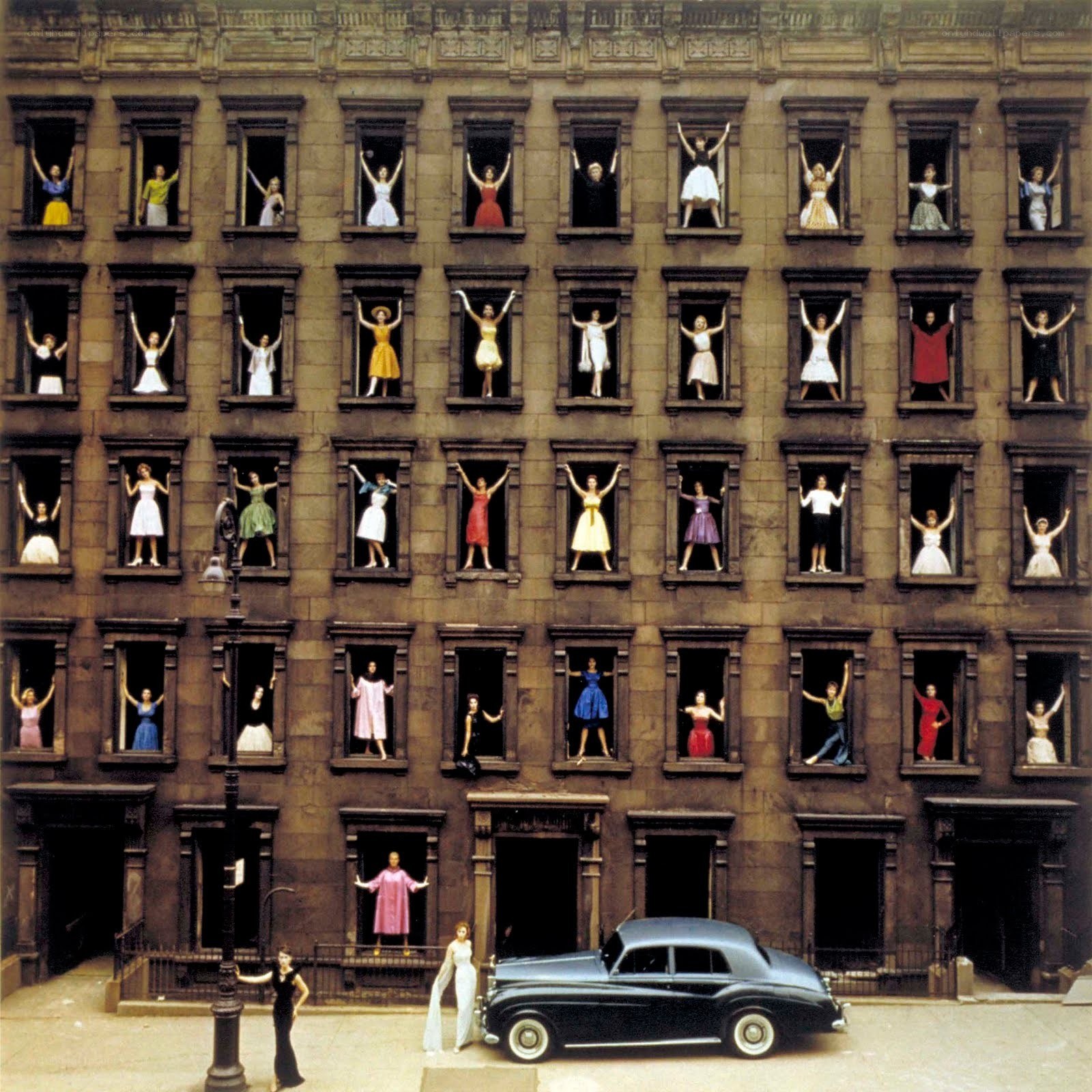 Women in windows building