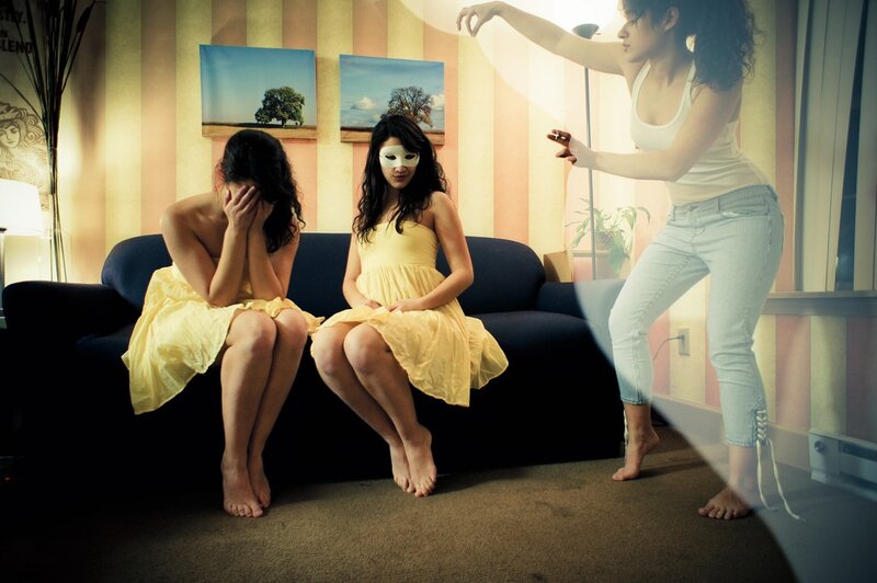 Women in yellow dresses on a couch