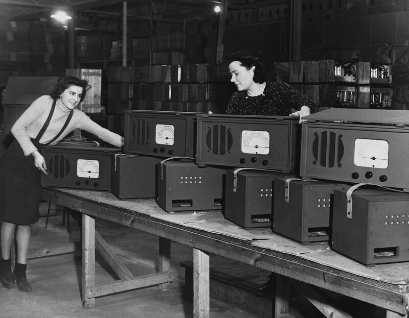 Women inspecting radios in factory