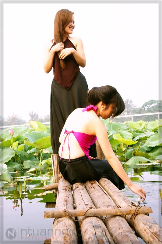 Women on a bamboo raft