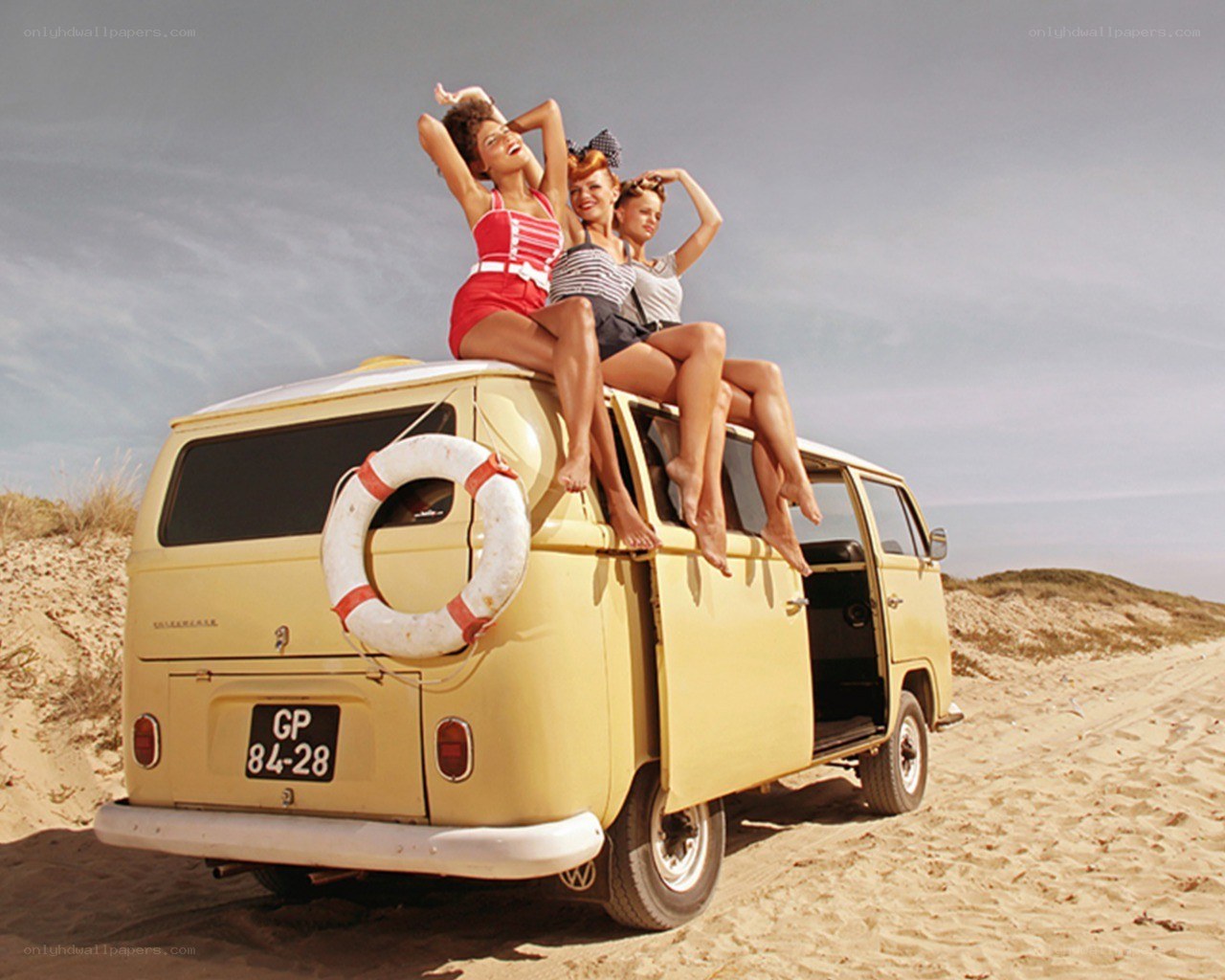 Women on a beach van