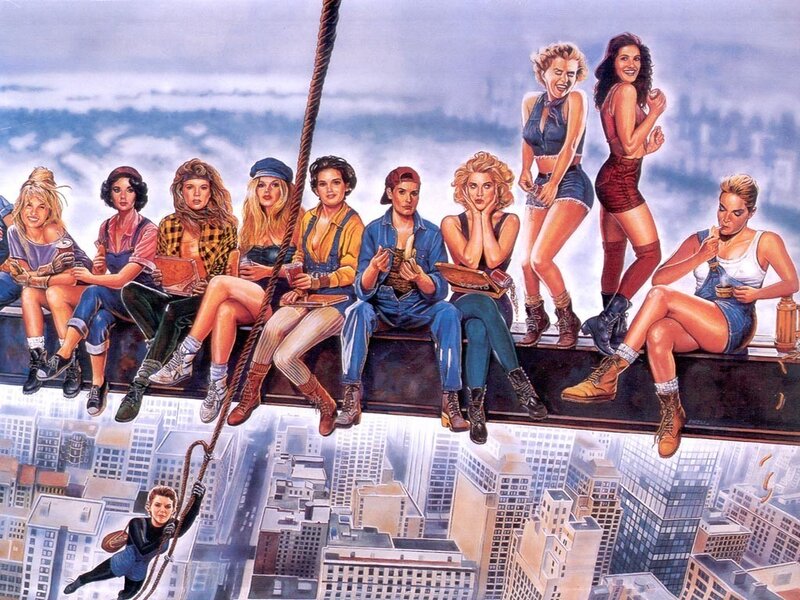 Women on a beam above city