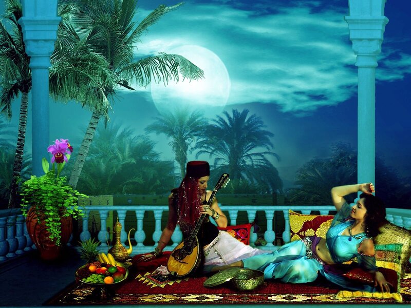 Women on a moonlit balcony