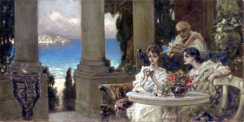 Women on a terrace overlooking the sea