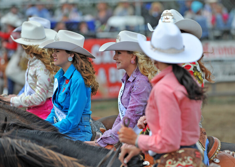 Women on Horses at Rodeo