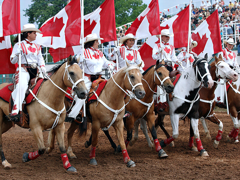 Women on Horses with Flags